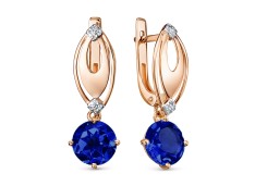 Золотые cерьги висячие с корундом