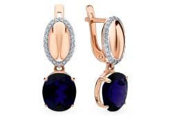 Золотые cерьги висячие с корундом